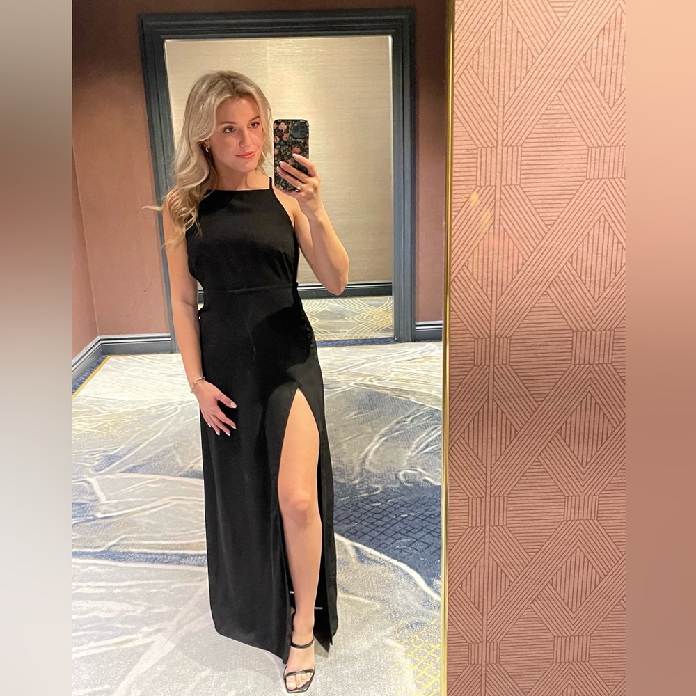 Floor length black open back gown